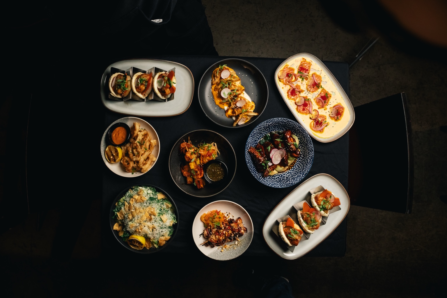 A table of colourful dishes prepared by Chef Gibson